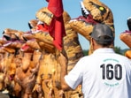 People in T-Rex dinosaur costumes, running the race at Washington. (Rachael Jones/Seattle Refined) People in T-Rex dinosaur costumes, running the race at Washington. (Rachael Jones/Seattle Refined)