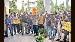 Students of Panjab University's University Institute of Engineering and Technology protesting on the varsity campus on Tuesday.  (HT)