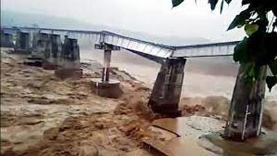 Amid unprecedented rainfall in Kangra valley, railway services on the Pathankot-Joginderngar railway line were suspended on July 14. A crack had developed on Pier 3 on Chakki on July 3 due to a flashflood, and on August 20, three piers of Bridge 32 (Chakki Bridge) between Dalhousie Road and Nurpur Road (Chakki Bank) were washed away in a flash flood. (HT File) Amid unprecedented rainfall in Kangra valley, railway services on the Pathankot-Joginderngar railway line were suspended on July 14. A crack had developed on Pier 3 on Chakki on July 3 due to a flashflood, and on August 20, three piers of Bridge 32 (Chakki Bridge) between Dalhousie Road and Nurpur Road (Chakki Bank) were washed away in a flash flood. (HT File)