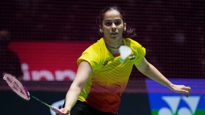 Saina Nehwal of India plays a return during a badminton game of the women's singles against Cheung Ngan Yi of Hong Kong (AP) Saina Nehwal of India plays a return during a badminton game of the women's singles against Cheung Ngan Yi of Hong Kong (AP)