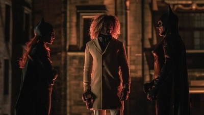 Leslie Grace and Michael Keaton in costume in a still from Batgirl. Leslie Grace and Michael Keaton in costume in a still from Batgirl.