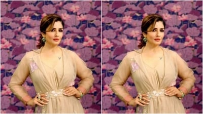 Raveena added more glam to her look with emerald earrings from the shelves of Sangeeta Boochra, and an emerald bracelet from the house of Masaya by Nirali Haria. (Instagram/@officialraveenatandon)