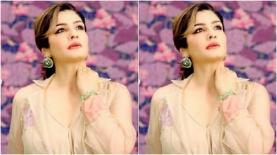 Raveena played muse to fashion designer house Itara An Another and picked an ivory white ensemble for the pictures. (Instagram/@officialraveenatandon)