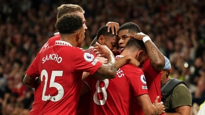 Manchester United's Marcus Rashford celebrates with his teammates after scoring his side's second goal during the English Premier League soccer match between Manchester United and Liverpool at Old Trafford stadium. (AP) Manchester United's Marcus Rashford celebrates with his teammates after scoring his side's second goal during the English Premier League soccer match between Manchester United and Liverpool at Old Trafford stadium. (AP)