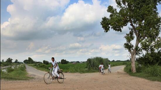 Girls cycling to school near Jewar in Uttar Pradesh. (Ajay Aggarwal /HT Photo) Girls cycling to school near Jewar in Uttar Pradesh. (Ajay Aggarwal /HT Photo)
