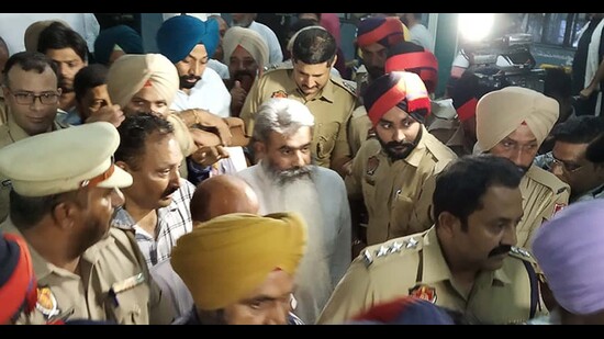 Bharat Bhushan Ashu being produced before the cin Ludhiana on Tuesday. (Harvinder Singh/HT)