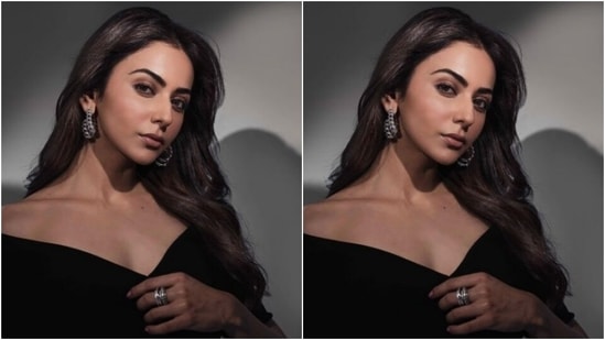 Rakul Preet’s little black dress came with a plunging neckline and spread shoulders. It also featured a knot detail at one side of the waist and a thigh high slit.(Instagram/@rakulpreet)