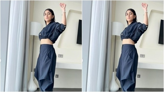 Styled by fashion stylist Sheefa J Gilani, Mrunal wore her strands open with straight locks and accessorized with nude eyeshadow, black eyeliner, full-on mascara lashes and a shade of nude lipstick.(Instagram/@ mrunalthakur)