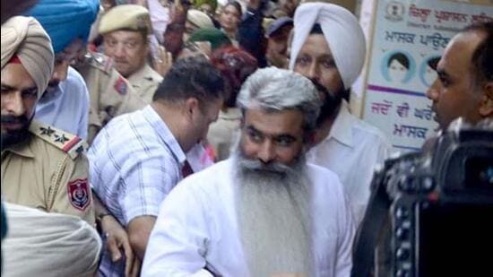 Former minister Bharat Bhushan Ashu being produced in the Ludhiana court on Tuesday. (Harvinder Singh/HT)