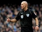 Referee Howard Webb gestures during a Premier League match. Referee Howard Webb gestures during a Premier League match.