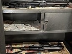 Two AK-47s were kept on two different racks of the almirah at the residence of Hemant Soren's aide. (Photo: sources) Two AK-47s were kept on two different racks of the almirah at the residence of Hemant Soren's aide. (Photo: sources)