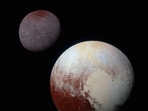 Enhanced colour images of Pluto (lower right) and its largest moon - Charon (upper left), taken by NASA’s New Horizons spacecraft.( NASA/JHUAPL/SwRI) Enhanced colour images of Pluto (lower right) and its largest moon - Charon (upper left), taken by NASA’s New Horizons spacecraft.( NASA/JHUAPL/SwRI)