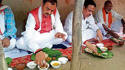 Uttar Pradesh deputy chief minister Keshav Prasad Maurya having lunch at a BJP worker’s place in Amethi on Wednesday. (SOURCED IMAGE) Uttar Pradesh deputy chief minister Keshav Prasad Maurya having lunch at a BJP worker’s place in Amethi on Wednesday. (SOURCED IMAGE)