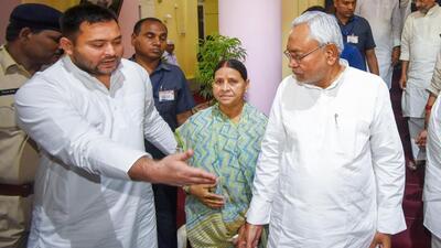 Bihar chief minister Nitish Kumar (right) along with deputy CM Tejashwi Yadav and RJD leader Rabri Devi during a special session of the assembly in Patna on Wednesday. (PTI Photo) Bihar chief minister Nitish Kumar (right) along with deputy CM Tejashwi Yadav and RJD leader Rabri Devi during a special session of the assembly in Patna on Wednesday. (PTI Photo)