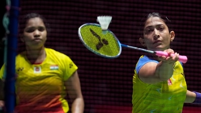 Ashwini Ponnappa of India, with Reddy N. Sikki, plays a return during a badminton game of the women's doubles against Chen Qing Chen and Jia Yi Fan of China in the BWF World Championships. (AP) Ashwini Ponnappa of India, with Reddy N. Sikki, plays a return during a badminton game of the women's doubles against Chen Qing Chen and Jia Yi Fan of China in the BWF World Championships. (AP)