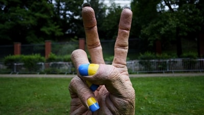 A statue of a hand with finger nails painted in Ukraine's national colors was placed in front of the Russian embassy in Prague, Czech Republic. (AP) A statue of a hand with finger nails painted in Ukraine's national colors was placed in front of the Russian embassy in Prague, Czech Republic. (AP)