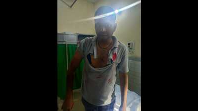 The forest department field staff, Nirmal Singh, suffered serious injuries on the face, back, arms and hands in the attack. (HT) The forest department field staff, Nirmal Singh, suffered serious injuries on the face, back, arms and hands in the attack. (HT)