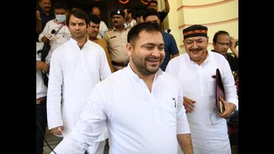 Bihar Deputy Chief Minister Tejashwi Yadav leaves Bihar Assembly in Patna on Wednesday. (Santosh Kumar/HT Photo) Bihar Deputy Chief Minister Tejashwi Yadav leaves Bihar Assembly in Patna on Wednesday. (Santosh Kumar/HT Photo)
