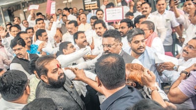 A scuffle between MLAs of NCP and Eknath Shinde's rebel camp ensued at the steps of the Vidhan Bhavan due to verbal exchanges from both the sides against each other during the protests on Wednesday. (Satish Bate/HT PHOTO) A scuffle between MLAs of NCP and Eknath Shinde's rebel camp ensued at the steps of the Vidhan Bhavan due to verbal exchanges from both the sides against each other during the protests on Wednesday. (Satish Bate/HT PHOTO)
