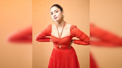 Tamannaah Bhatia's dress features a waist cut-out design and a full pleated midi skirt. (Instagram/@tamannaahspeaks)