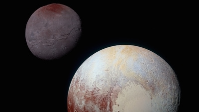 Enhanced colour images of Pluto (lower right) and its largest moon - Charon (upper left), taken by NASA’s New Horizons spacecraft. ( NASA/JHUAPL/SwRI)