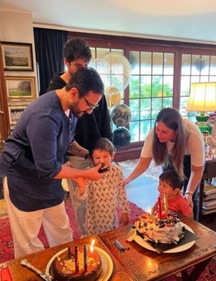 Saif Ali Khan feeds cake to Taimur Ali Khan on his birthday. Saif Ali Khan feeds cake to Taimur Ali Khan on his birthday.