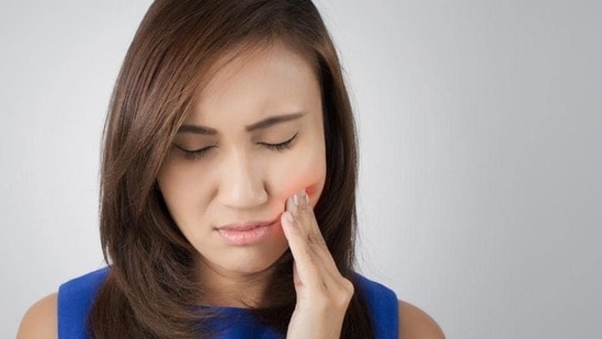 Canker sores, also known as mouth ulcers, are painful sores that occur in the mucous membrane of the oral cavity. These sores develop in the soft tissue lining of your gums, tongue, inner cheeks, lips or palate. While mostly harmless, they can cause pain and a lot of discomforts.(Shutterstock)