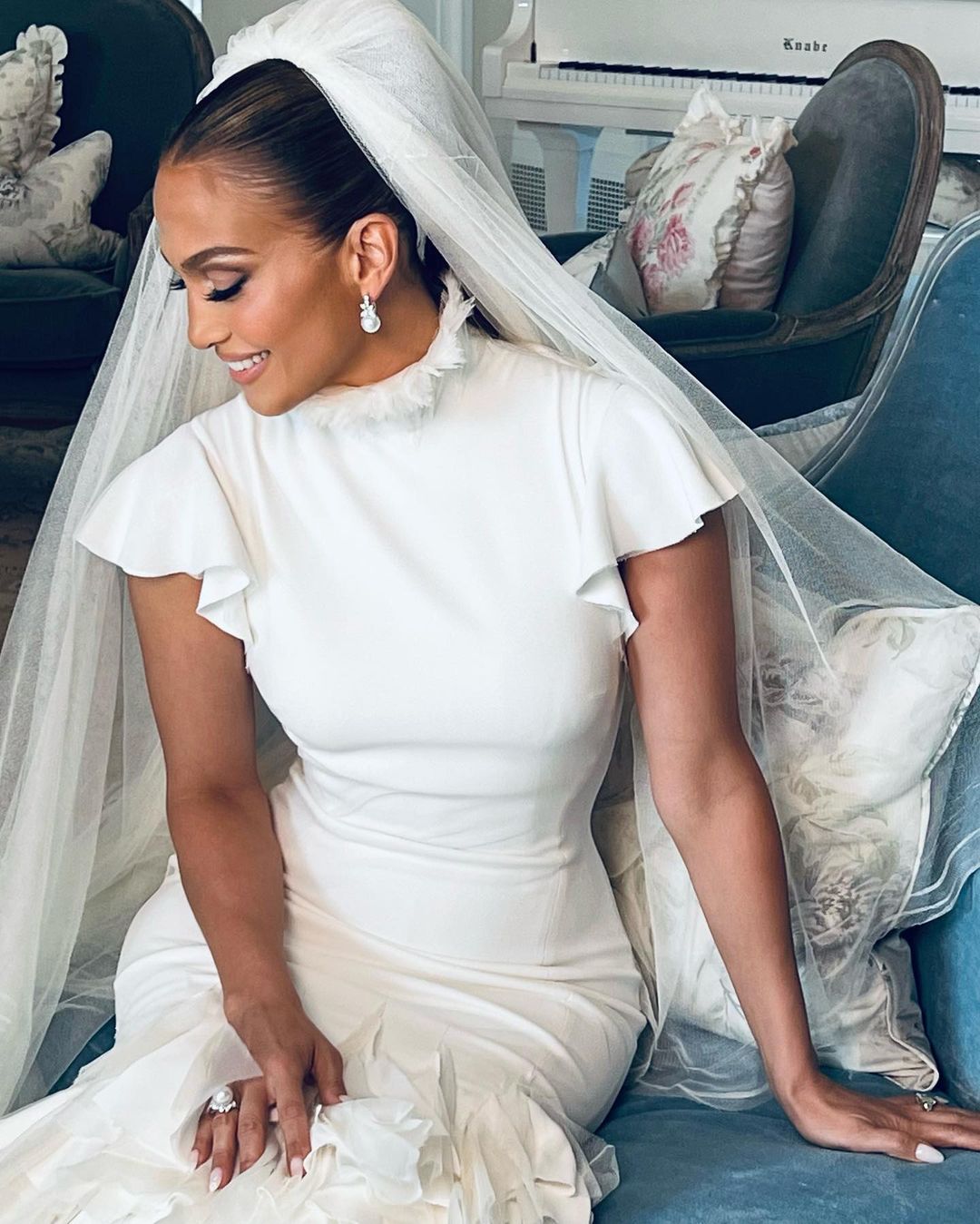 Jennifer Lopez wore three weddings dresses created by fashion designer Ralph Lauren . Jennifer Lopez wore three weddings dresses created by fashion designer Ralph Lauren .
