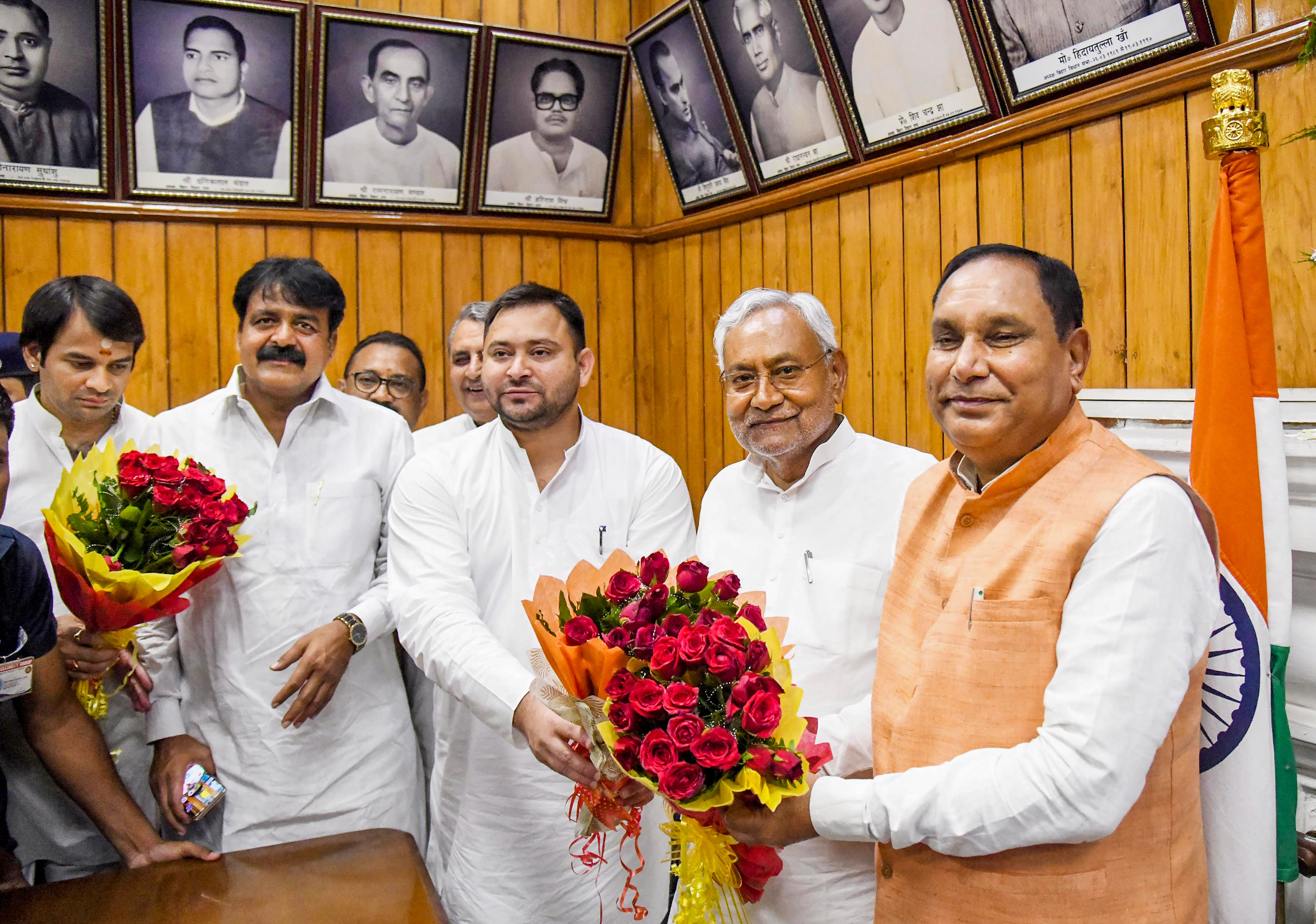 Bihar chief minister Nitish Kumar and deputy CM Tejashwi Yadav greet acting speaker Maheshwar Hazari during the special session of Assembly on Wednesday. (PTI) Bihar chief minister Nitish Kumar and deputy CM Tejashwi Yadav greet acting speaker Maheshwar Hazari during the special session of Assembly on Wednesday. (PTI)