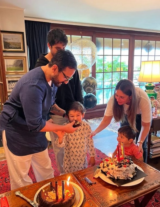 Saif Ali Khan feeds cake to Taimur Ali Khan on his birthday.