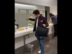 The image, taken from the viral video on Instagram, shows a magician doing magic trick in the washroom. (Instagram/@xaviermortimer) The image, taken from the viral video on Instagram, shows a magician doing magic trick in the washroom. (Instagram/@xaviermortimer)