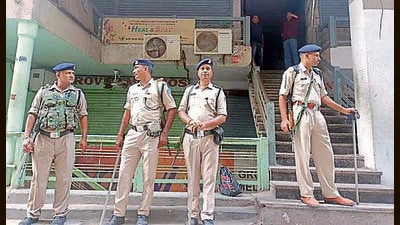 Central Reserve Police Force (CRPF) men were deployed at the stores and residences that were raided, and no one was permitted to enter or exit the premises. (HT PHOTO)
