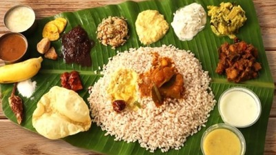 Onam Sadhya (Grand meal): This special traditional meal is prepared on Onam and is served on a banana leaf. It features more than 24 items that sometimes go up to 64 dishes. (Instagram/@alreefpanasiabh)