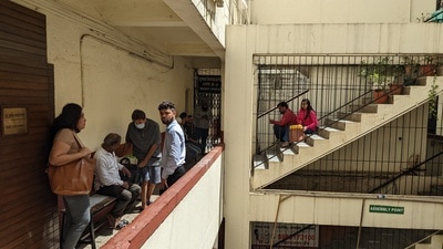 People wait outside the Chandannagar sub-registrar office on Thursday. (Shankar Narayan/HT PHOTO) People wait outside the Chandannagar sub-registrar office on Thursday. (Shankar Narayan/HT PHOTO)