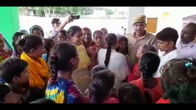 The image, taken from the Twitter video, shows the ‘cop teacher’ in Uttar Pradesh (Twitter/@upcopsachin) The image, taken from the Twitter video, shows the ‘cop teacher’ in Uttar Pradesh (Twitter/@upcopsachin)