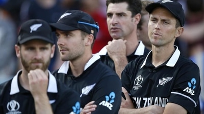 New Zealand's Trent Boult, right, crosses his arms as he waits for the trophy presentation (AP) New Zealand's Trent Boult, right, crosses his arms as he waits for the trophy presentation (AP)