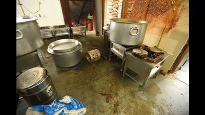 The cooker blast took place around 5 am on Thursday while rajma-chawal was being prepared for the schoolchildren. Another helper also suffered light burns on the leg. (Keshav Singh/HT)