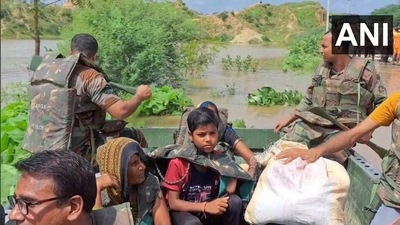 Visual from rescue operations conducted by Army in 80 flood-affected villages of Rajasthan as Chambal river started flowing above the danger mark in Dholpur. (ANI/Twitter) Visual from rescue operations conducted by Army in 80 flood-affected villages of Rajasthan as Chambal river started flowing above the danger mark in Dholpur. (ANI/Twitter)