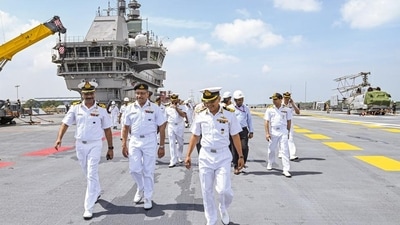 Indian Navy personnel after taking delivery of the prestigious indigenous aircraft carrier Vikrant' from builder Cochin Shipyard Ltd in Kochi on Thursday.&nbsp; (PTI)