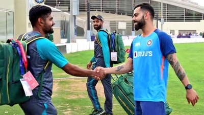 A video of Babar Azam and Virat Kohli's brief meeting won hearts (BCCI Screengrab) A video of Babar Azam and Virat Kohli's brief meeting won hearts (BCCI Screengrab)