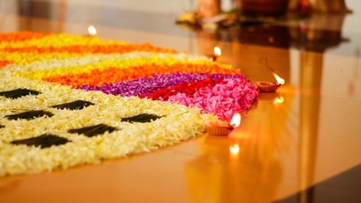 Pookalam (Floral rangoli): This is a floral floor decoration that is made using fresh flowers. ‘Poo’ stands for flower and ‘Kolam’ stands for design in Malayalam. This floral carpet symbolises the spirit of unity. (Unsplash)