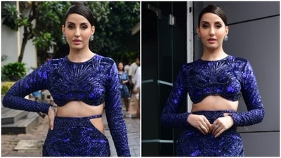 Nora Fatehi displays sultry silhouette in infinity blouse and thigh-slit skirt on Jhalak Dikhhla Jaa 10 sets (HT Photo/Varinder Chawla) Nora Fatehi displays sultry silhouette in infinity blouse and thigh-slit skirt on Jhalak Dikhhla Jaa 10 sets (HT Photo/Varinder Chawla)