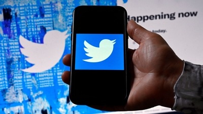 Twitter says it has 238 million active monthly users, and that about 5% of the accounts it sells ads against are fake, either spam or bots. (AFP)