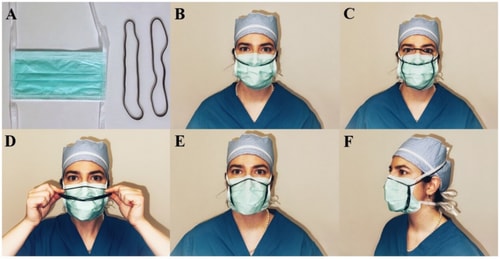 A demonstrator shows how to use a surgical mask with an eight inch rubber band for a better fit.&nbsp;