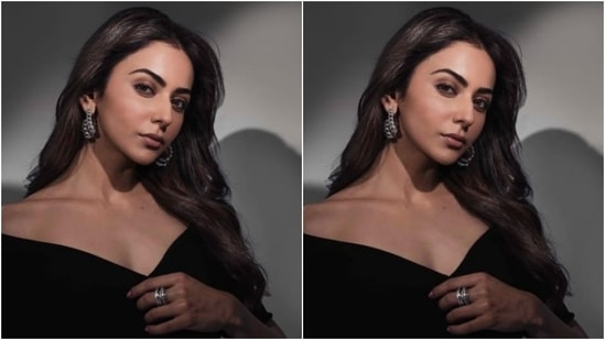 Rakul Preet’s little black dress features a plunging neckline, knot detail at one side of the waist and a thigh high slit.(Instagram/@rakulpreet)
