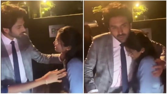 Kartik Aaryan comforts an emotional fan.