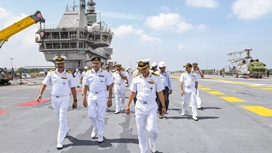 Indian Navy personnel after taking delivery of the prestigious indigenous aircraft carrier Vikrant' from builder Cochin Shipyard Ltd in Kochi on Thursday.&nbsp;(PTI)