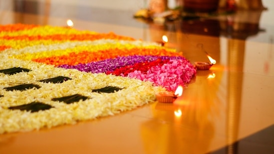 Pookalam (Floral rangoli): This is a floral floor decoration that is made using fresh flowers. ‘Poo’ stands for flower and ‘Kolam’ stands for design in Malayalam. This floral carpet symbolises the spirit of unity.(Unsplash)