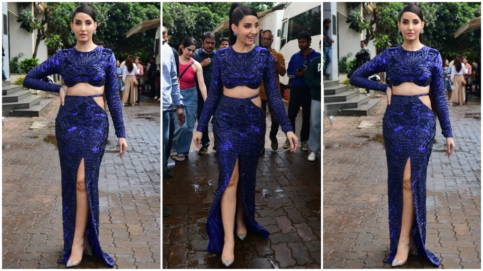 Nora Fatehi dons a blue embellished infinity blouse and thigh-slit skirt for Jhalak Dikhhla Jaa.&nbsp;(HT Photo/Varinder Chawla)