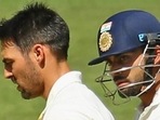 File photo of Mitchell Johnson (L) and Virat Kohli